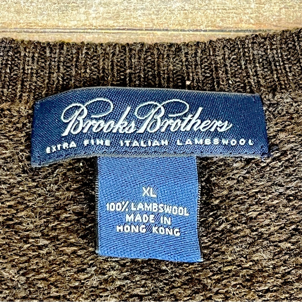 Brooks Brothers lambs wool vest XL. Does have some holes shown in pictures.